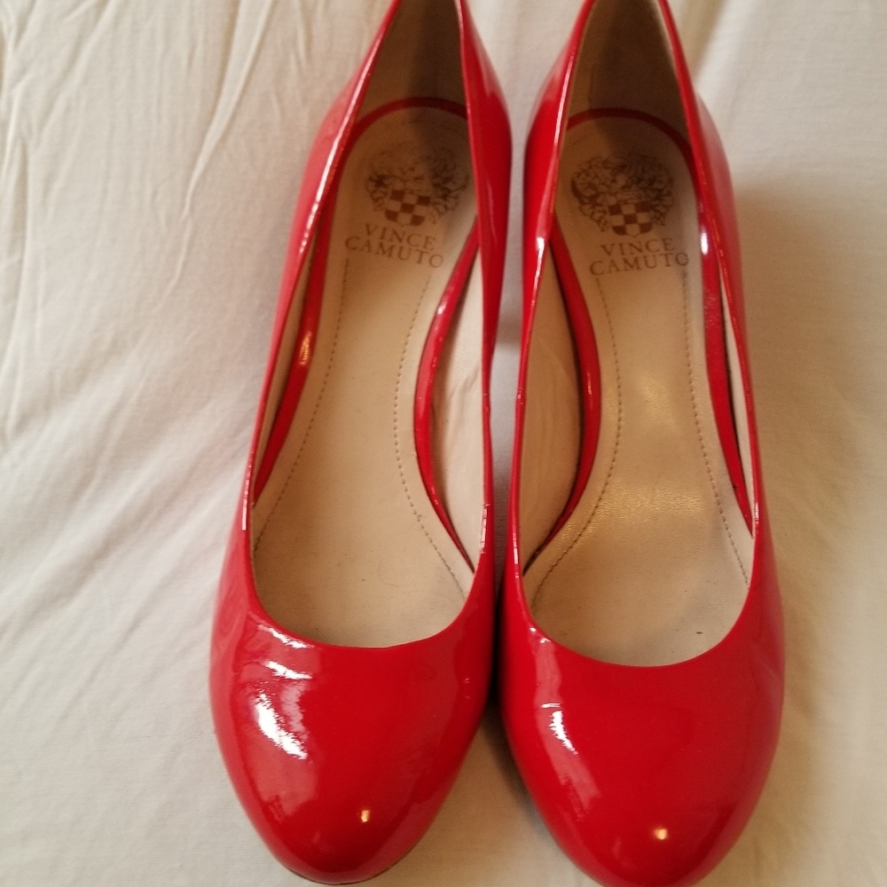 Like new red patent pumps